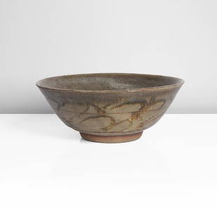 Bernard Leach (British, 1887-1979): Stoneware, layered grey and iron glazes with an iron painted wave and dot pattern around the exterior, a roundel with foliate motif in the well, impressed BL and Leach Pottery seals "All bidding must