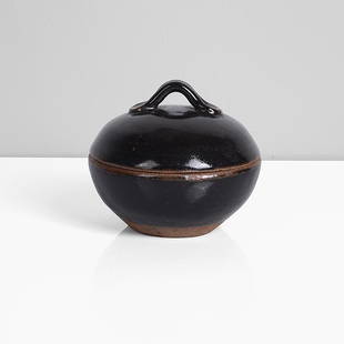 Bernard Leach (British, 1887-1979): Stoneware, layered tenmoku over iron glaze, the domed lid with a small looping handle, impressed BL and Leach Pottery seals "All bidding must be placed through the Maak Contemporary Ceramics