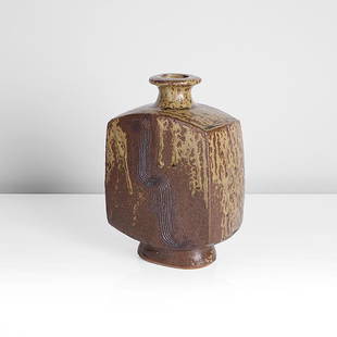 Bernard Leach (British, 1887-1979): Stoneware, layered green ash over iron glazes, incised zig-zag design front and back, impressed BL and Leach Pottery seals "All bidding must be placed through the Maak Contemporary Ceramics website.