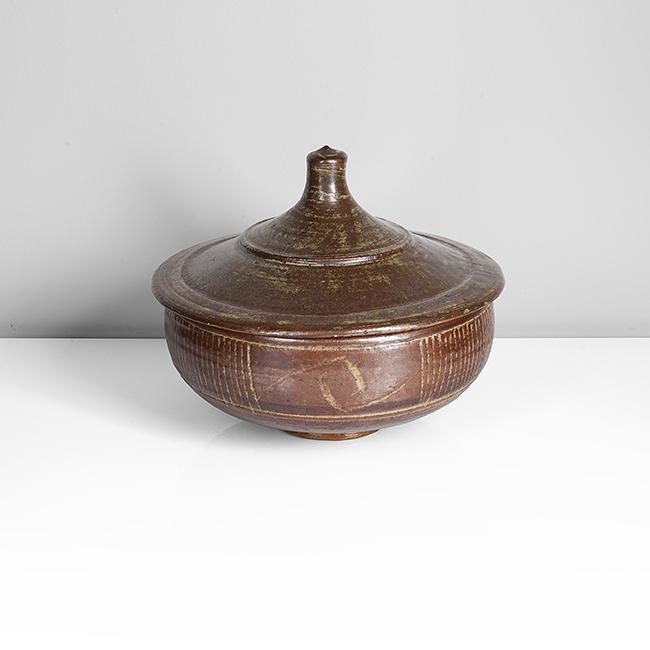 Bernard Leach (British, 1887-1979): Stoneware, iron glaze with incised 'sun' motif and linear design inlaid with white glaze, impressed BL and Leach Pottery seals "All bidding must be placed through the Maak Contemporary Ceramics websit