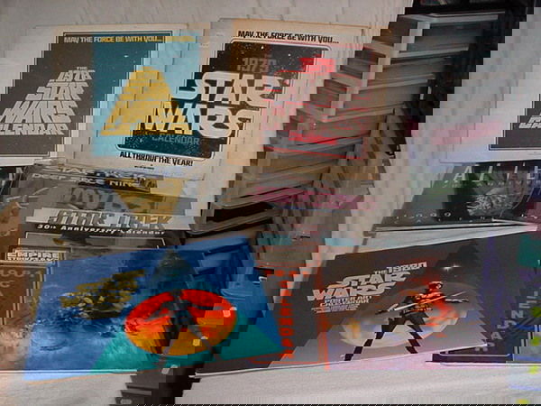 11 STAR WARS CALENDARS , INCL 1978 STAR WARS MAY T: 11 STAR WARS CALENDARS , INCL 1978 STAR WARS MAY THE FORCE BE WITH YOU, 1979 STAR WARS ALL THROUGH THE YEAR MAY THE FORCE BE WITH YOU, THE 1980 POSTER ART CALENDAR, 1981 THE EMPIRE STRIKES BACK, STAR