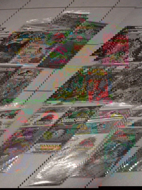 45 TOPPS COMICS - JURASSIC PARK, INCL. LTD EDT OF: 45 TOPPS COMICS - JURASSIC PARK, INCL. LTD EDT OF #4 (SPITTER), #4 (TREX), #4 (EGG HATCHING), & #4 (RAPTOR), THE LOST WORLD JURASSIC PARK NOS 1/2/3/4 OF 4 & NO. 1 LTD EDT NO. 0546 OF 1000 SIGNED BY DO