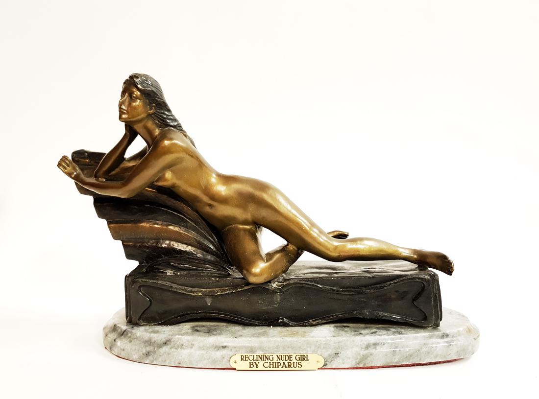 Reclining Nude Girl Bronze Figurine By Chiparus (After): "Reclining Nude Girl" Patina-ted Bronze Statue By D.H.Chiparus (After) on Marble Base, Signed, Early 20th Century. 17.1/2" x 5.1/2" x H 11.1/4" (Heavy Weight).