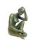 A SEATED NUDE FEMALE BRONZE SCULPTURE