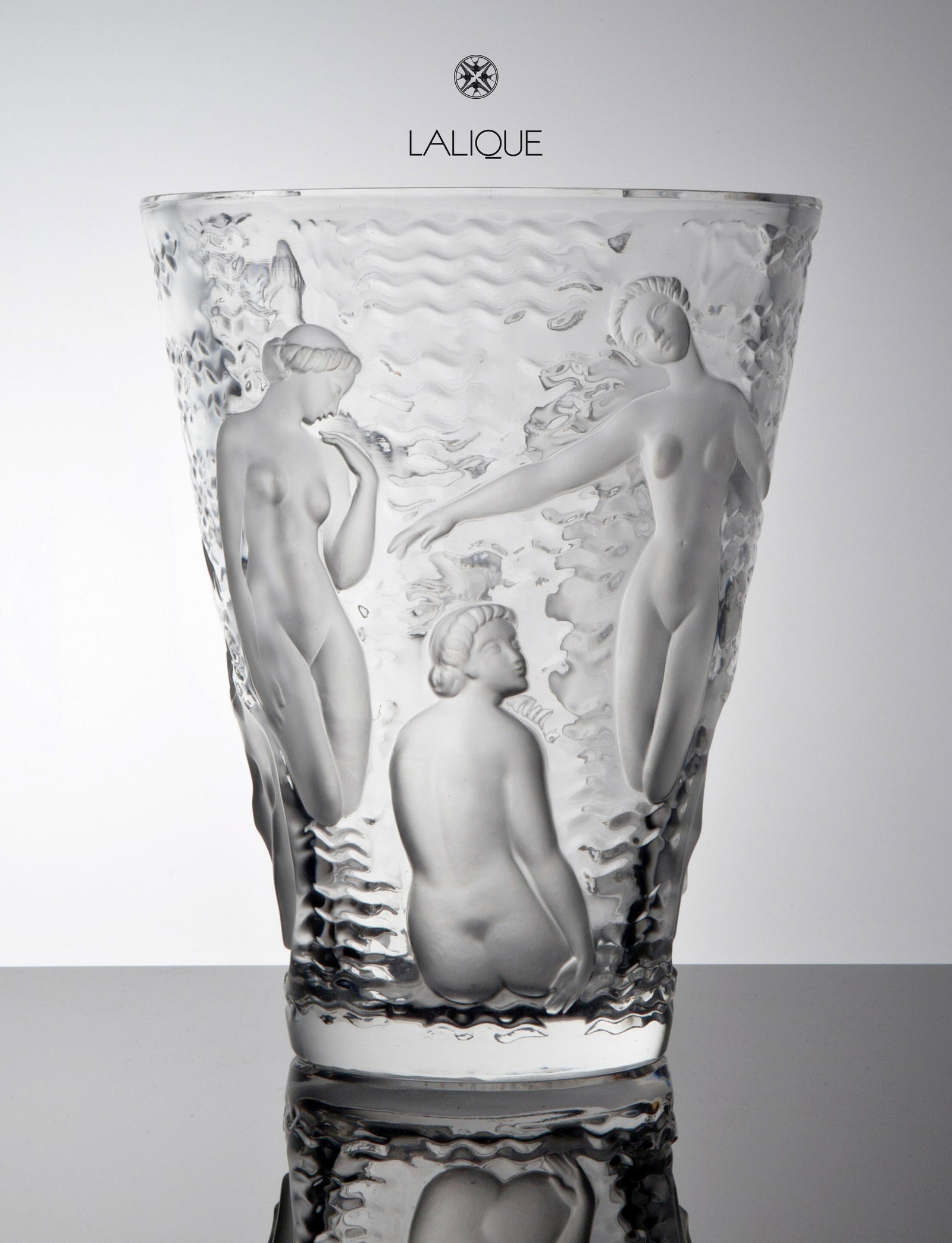 Ondines, A Large & Heavy LALIQUE Crystal Vase, Signed: Ondines, A Vintage 1960's Large & Heavy LALIQUE Crystal Vase, Signed Lalique France. Crystal vase nude "Ondines" designed by Marc Lalique in 1952. About: An Ondine is a water nymph and stems from Germ