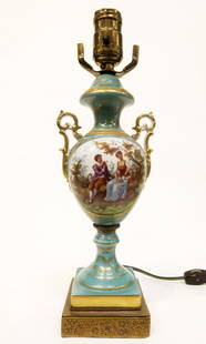 A Continental Hand Painted Porcelain Lamp: A Continental Hand Painted Porcelain Lamp. H 11"