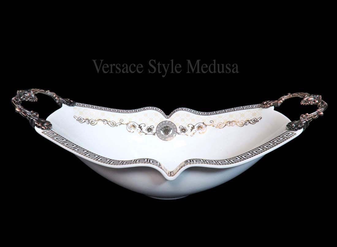 A Medusa Versace Style Porcelain Centerpiece: A Medusa Versace Style Porcelain Centerpiece Made By GK. 16" x 8.3" x H 5.3"