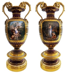 A PAIR OF 19TH C. ROYAL VIENNA PARCEL-GILT VASES