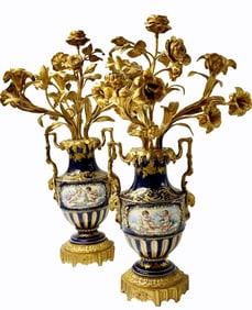 A Pair of Sevres Style Porcelain Bronze Candle Holders