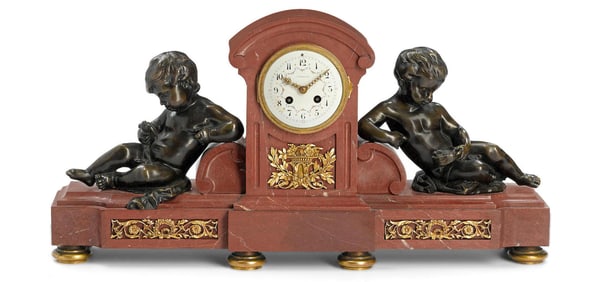 A Tiffany & Co. Gilt Bronze and Rouge Marble Clock