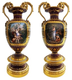 A PAIR OF 19TH C. ROYAL VIENNA PARCEL-GILT VASES