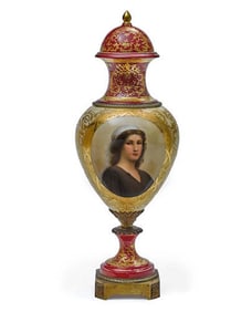 A GILT BRONZE MOUNTED SEVRES STYLE LIDDED URN, SIGNED