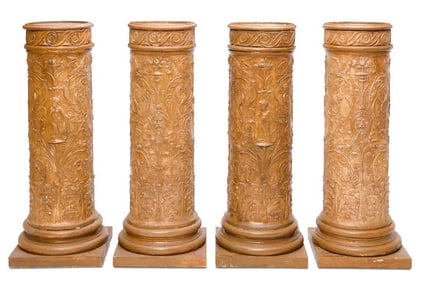 A SET OF FOUR PLASTER PEDESTALS