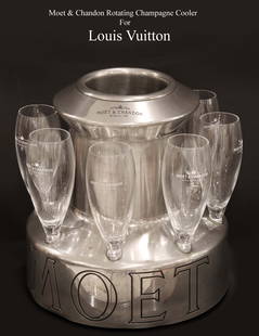 A Moet & Chandon Rotating Champagne Cooler Made For Louis Vuitton: Moet & Chandon Rotating Champagne Cooler for Louis Vuitton. About the item: Moet & Chandon, also known simply as Moet, is a French fine winery and part of the luxury goods company LVMH Moet Hennessy