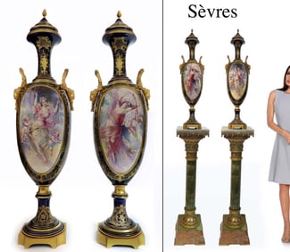 A PAIR OF SEVRES GILT BRONZE MOUNTED COVERED URNS