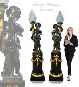 PAIR OF MONUMENTAL HENRY DASSON FIGURAL TORCHIERE LAMP