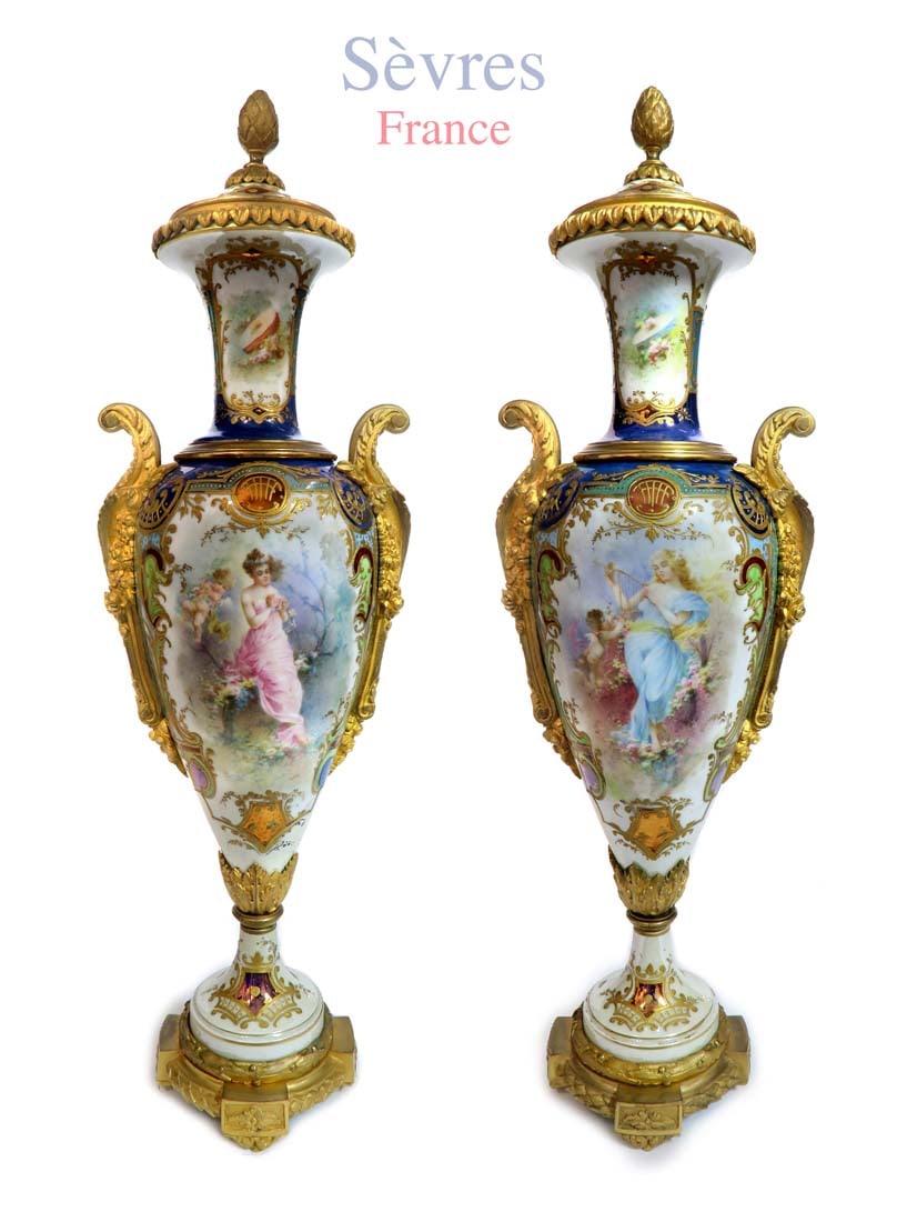 A Pair of Art Nouveau Sevres Porcelain Vases: A Pair of Art Nouveau French Sevres Porcelain Vases. H 20"