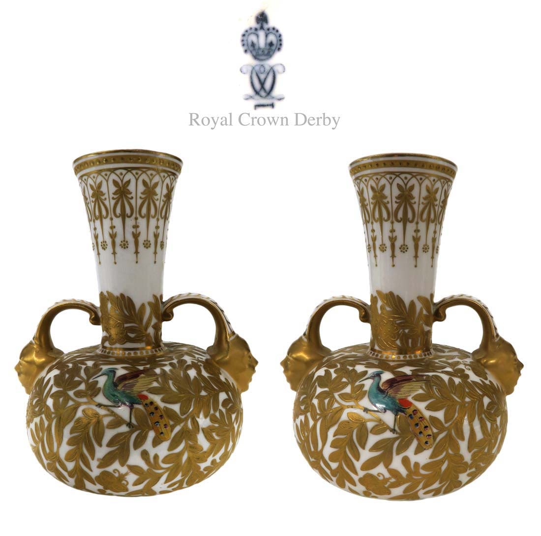 A Pair of Royal Crown Derby Hand Painted Vases, 19th C.: 19th C. Pair of Royal Crown Derby Hand Painted Porcelain Vases. Hallmarked. H 6.1/2". The Royal Crown Derby Porcelain Company is the oldest or second oldest remaining English porcelain manufacturer,