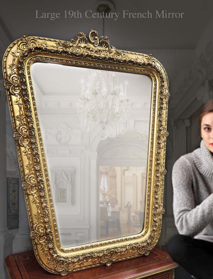 A Large 19th Century French Framed Wall Mirror: A Large 19th Century French Framed Wall Mirror. H 40" x 27"