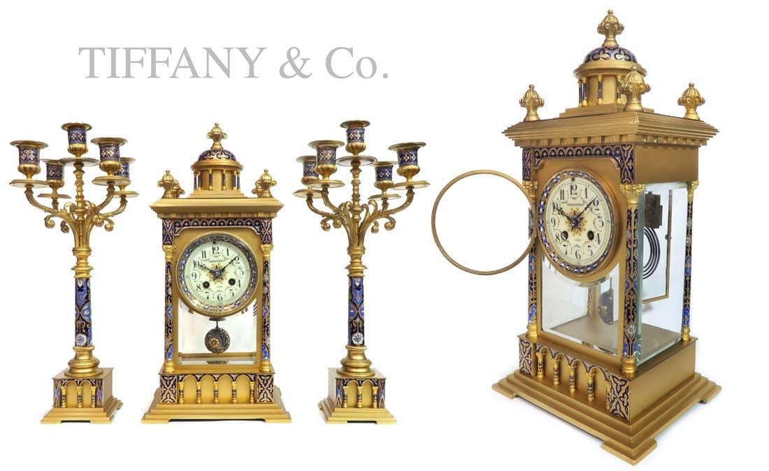 19th C. Tiffany & Co Champleve Enamel Clock Set: 19th C. French Tiffany & Co Champleve Enamel Clock Set. Clock: H 18" x 8.5" x 7", Candelabras: H 17" x W 6.5"