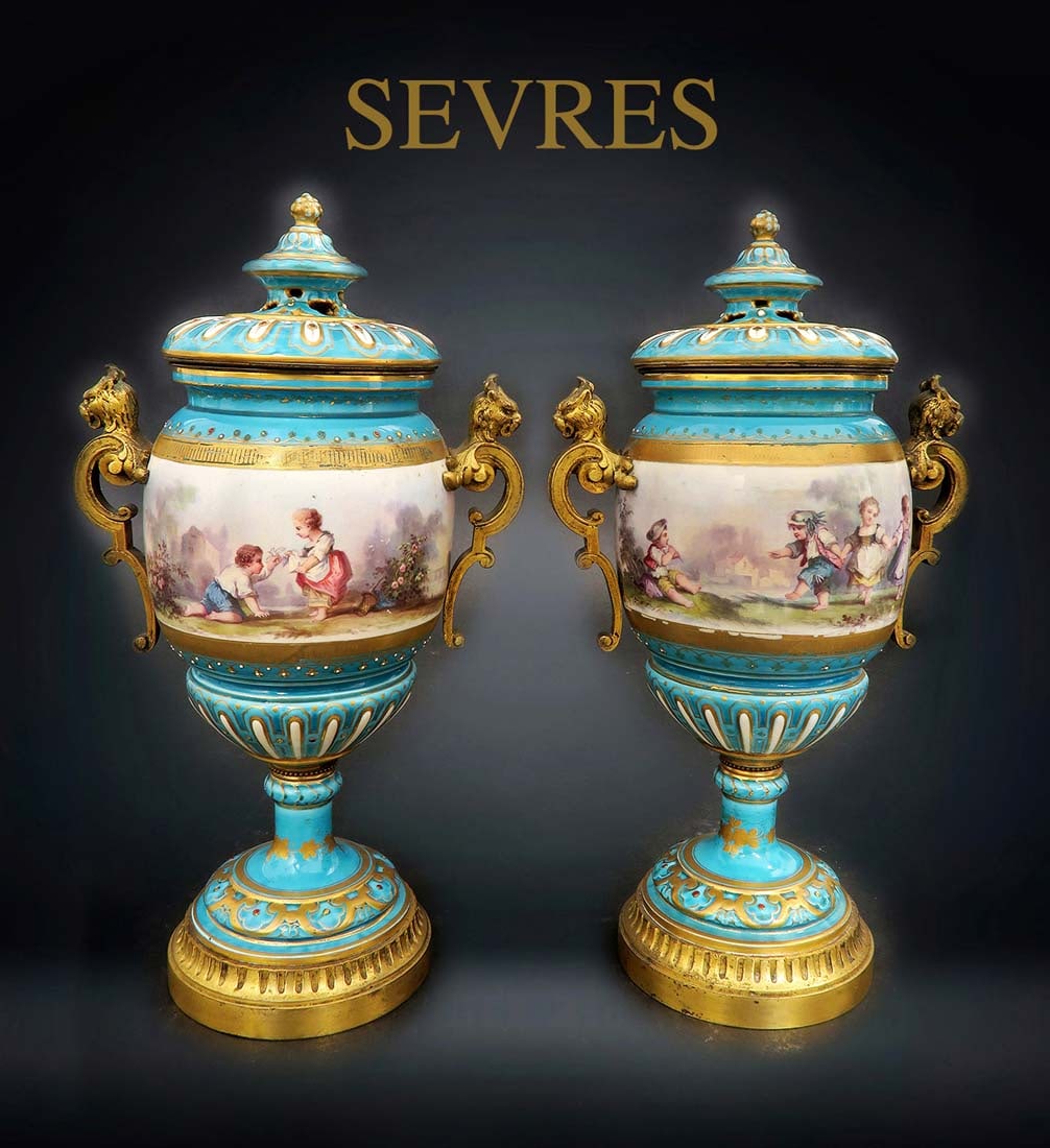 A Pair of 19th C. Jeweled Sevres Urns: A Pair of 19th C. Jeweled Sevres Hand Painted Porcelain Urns. H 12"