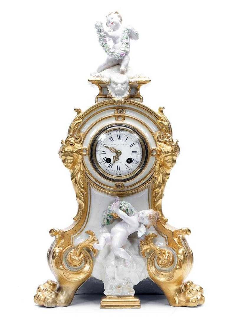 19th C. French Figural Porcelain & Gilt Mantel Clock: A Late 19th Century Porcelain & Gilt Mantel Clock. French works by Japy Freres, case signed with printed green anchor mark (possibly Vion & Baury of Paris), and retailer's marke for Wilhelm & Graef, N