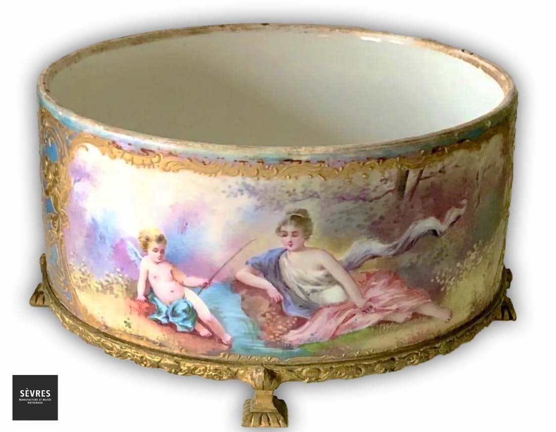 A French Sevres Hand Painted Porcelain Bronze Jardiniere/Centerpiece: A French Sevres Hand Painted Porcelain Bronze Jardiniere/Centerpiece. Signed by Paly. D 8" x H 4.5"
