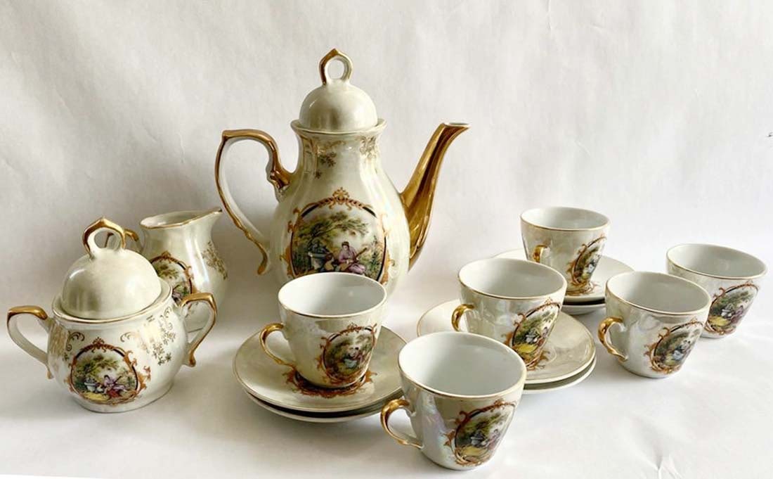 A Set of 9 Pieces Vintage Austrian Porcelain Coffee Service: A Set of 9 Pieces Vintage Austrian Porcelain Coffee Service.