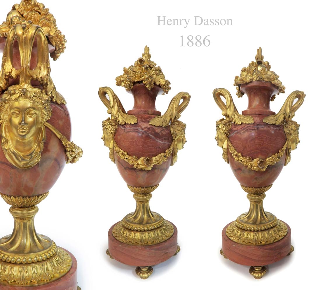 A Pair of Henry Dasson Figural Bronze Rouge Marble Urns: A Pair of 19th Century French Henry Dasson Figural Bronze Rouge Marble Urns.