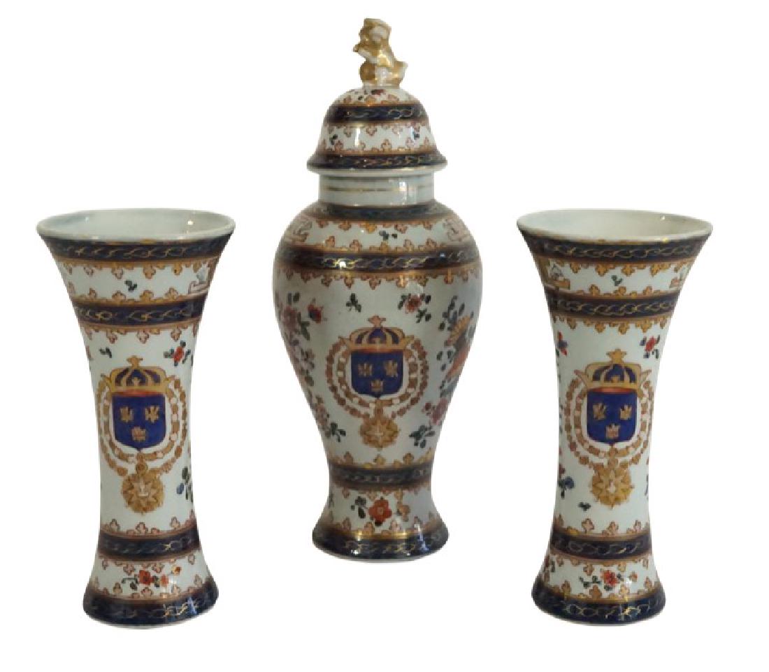 Samson Garniture Set of Three Armorial Vases: Lot 59 Samson Garniture Set of Covered Urn and Two Vases Porcelain Covered Urn 9 x 3 1/4 x 3 1/4 in. Two Vases 6 x 2 3/4 x 2 3/4 in. Est. $400-$600 
