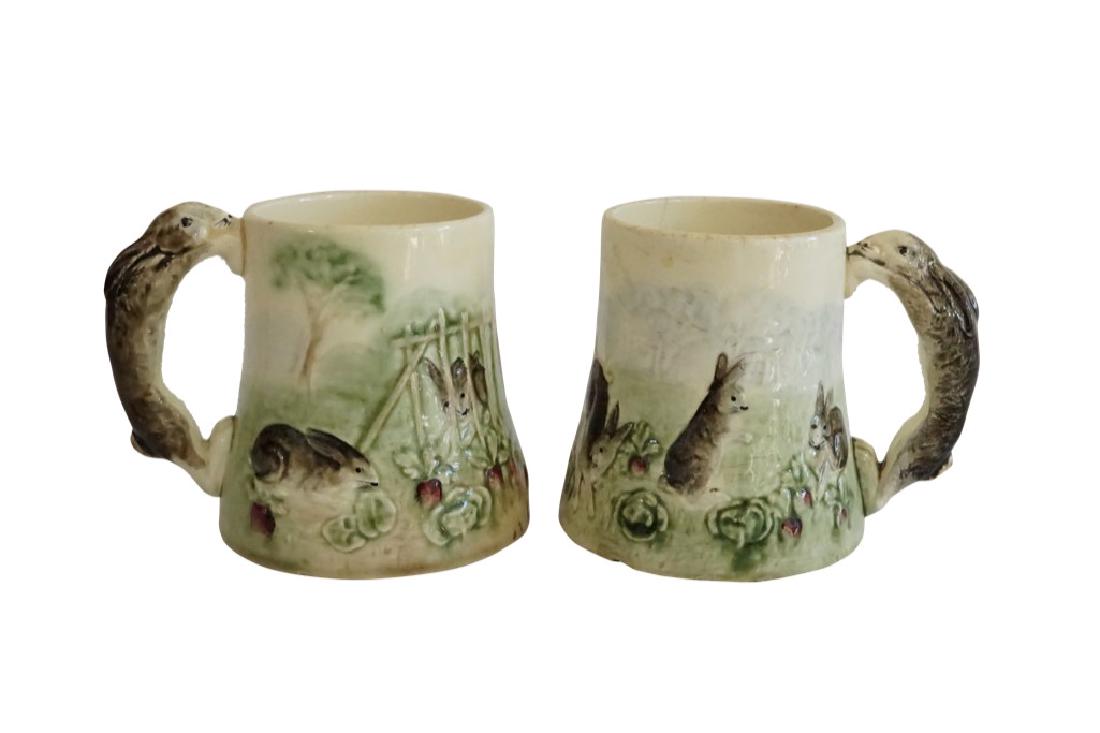 Higgins & Seiter Rabbit Mugs: Lot 96 Two Higgins & Seiter Rabbit Ceramic Mugs Ceramic Marked 3 3/4 x 4 1/4 in. Est. $50-$100