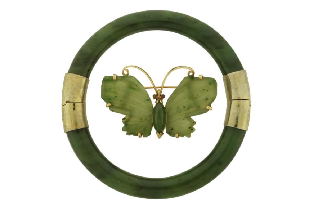 Jade Brooch and Bracelet: Lot 186 Jade Butterfly Brooch & Jade Bracelet Jade Butterfly brooch with 14k gold with two faceted 2mm rubies and jade clasp bracelet. Est. $450-$650
