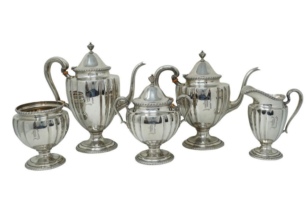 Whiting Sterling Silver Coffee and Tea Set [5 pieces: Lot 146 Whiting Sterling Silver Coffee and Tea Set [5 pieces total] Coffee pot, teapot, covered sugar, creamer, and waste bowl all engraved with a "B". Sterling Coffee pot: 10 x 9 1/2