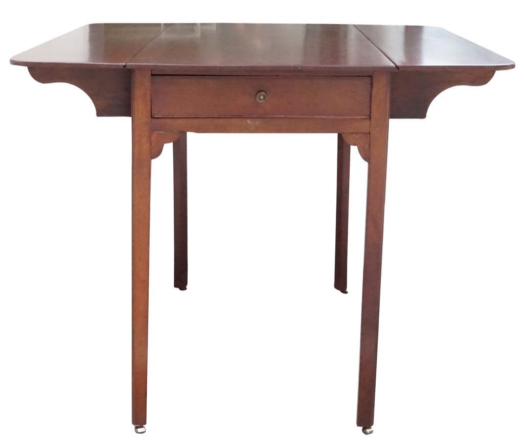 Card Table: Lot 242 Pembroke Table Pembroke table with one drawers on each end with round handles on casters. Mahogany 20th C. 28 1/2 x 36 x 36 in. 