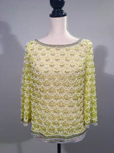 Yellow Blouse With Cut Crystals: Yellow acetate blouse covered in hand-cut crystal drops, white glass beads and Rhinestone sequins.