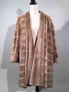 Sheared Mink 3/4 Coat: Tan Sheared Mink 3/4 coat, with horizontal pelts, wide lapel, size Medium-Large, Dimensions: 18" w x 39" l x 23" sleeve