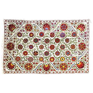 Vintage Suzani Coverlet: A vintage suzani coverlet with needlepoing decoration, Uzbekistan, 20th century. 57" x 88"