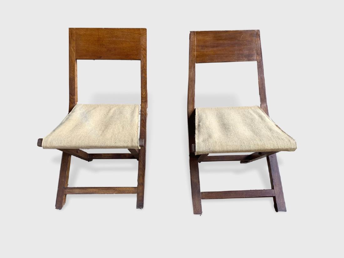 Two Similar French Folding Camp Chairs, 1940's: A pair of French 1940's folding camp chairs in oak with burlap seats. Dimensions: 17" w x 22" d 15" seat h 31" back h. Good condition.
