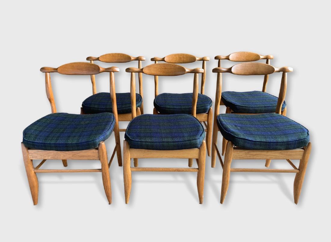 Set Of 6 Guillerme et Chambron Dining Chairs, 1940's: A set of 6 "yoke-back" dining chairs by Robert Guillerme and Jacques Chambron in oak, the seats recently reupholstered in plaid wool fabric, mid-1940's, France. Dimensions: 21" w x 21" d x 19" seat h,