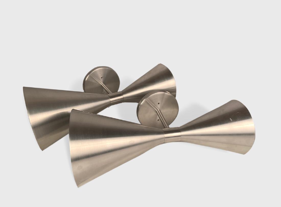 Pair Of Polished Aluminum Italian Sconces: A pair of large polished aluminum Italian sconces, dimensions 8" dia x 20" h x 11" from wall.