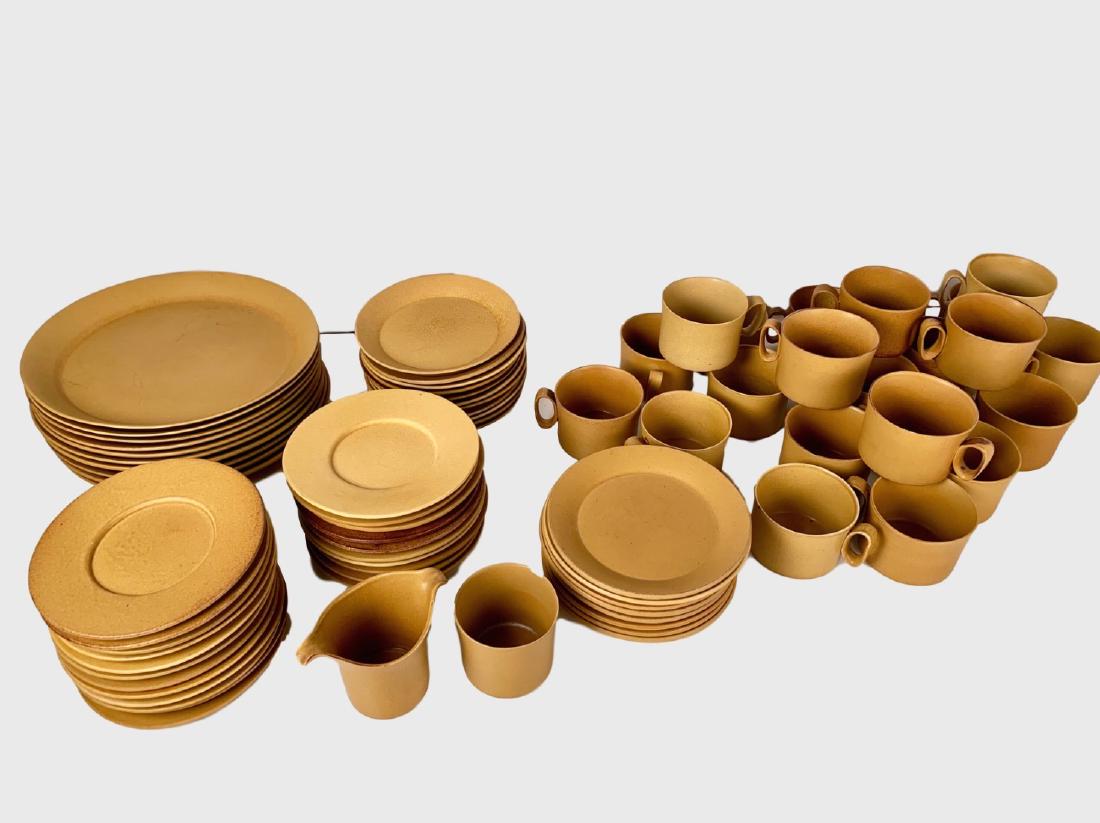 Large Set Of Bennington Pottery Dinnerware: Large dinner service of Bennington Pottery "Tawney" pattern, gold matte glaze, 101 pieces. Set includes: 10 dinner plates, 21 mugs, 19 small plates, 4 serving dishes 22 saucers, sugar bowl and creamer