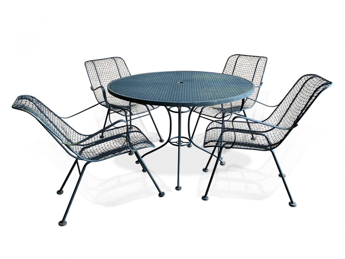 Woodard Style Garden Set: A Woodard Style Garden Dining Set, with a round table and 4 armchairs. Dimensions: Table- 41" dia x 27" h Chairs- 21" w x 28" d x 16" seat h, 24" arm h, 28" back h. Good condition.