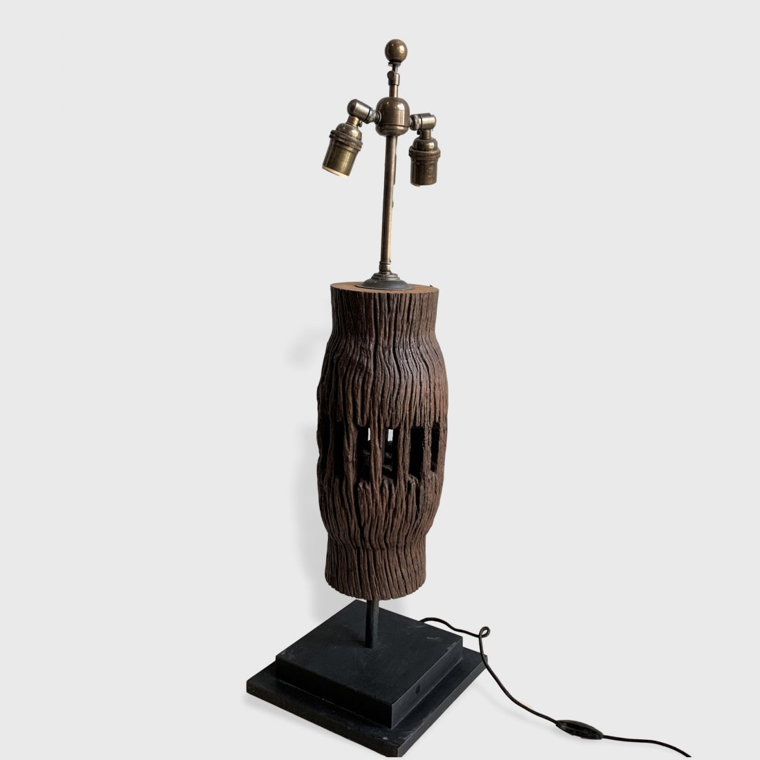 Rustic Asian Wheel Hub Lamp: A rustic wood wheel hub, 18thcentury, mounted as a table lamp. Chinese. 9" x 9" x 29" h