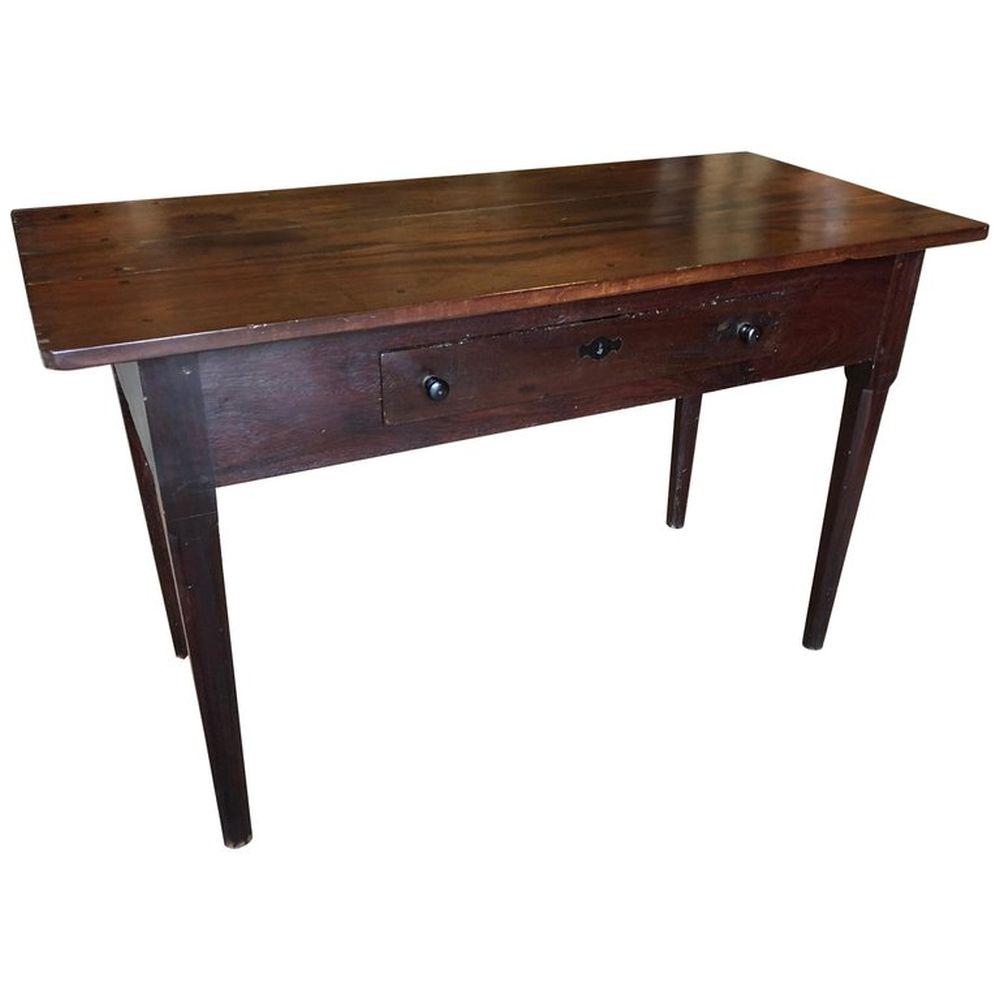 English Serving Table In Mahogany, C. 1820.: An English provincial Regency serving table, possibly Caribbean, old growth mahogany, with one drawer on tapered legs. 34" h x 55" w x 25" d