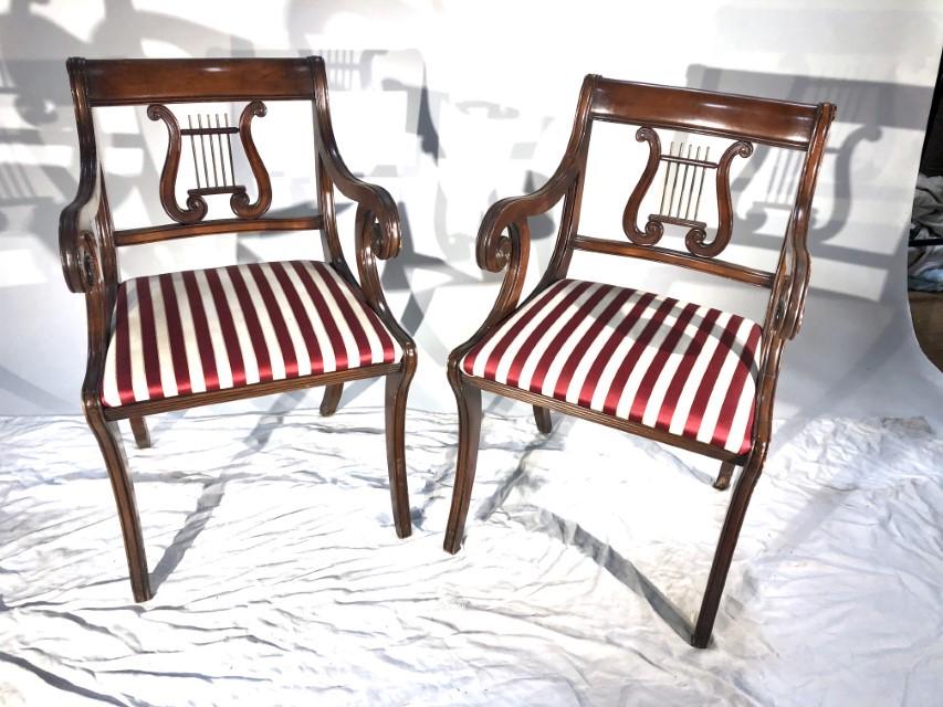 Pair of Duncan Phyfe Style Armchairs, Mahogany: A pair of Duncan Phyfe style neoclassical armchairs in mahogany. 22" w x 20" d 34" h x 18"seat h