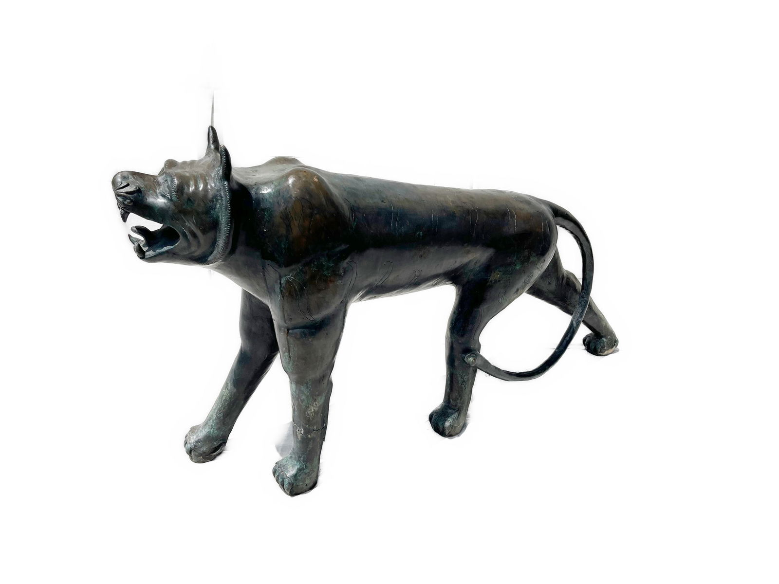 Phyllis Morris Cast Bronze Jungle Cat: An unusual large cast bronze lion, by artist Phyllis Morris, circa 1970-1979.