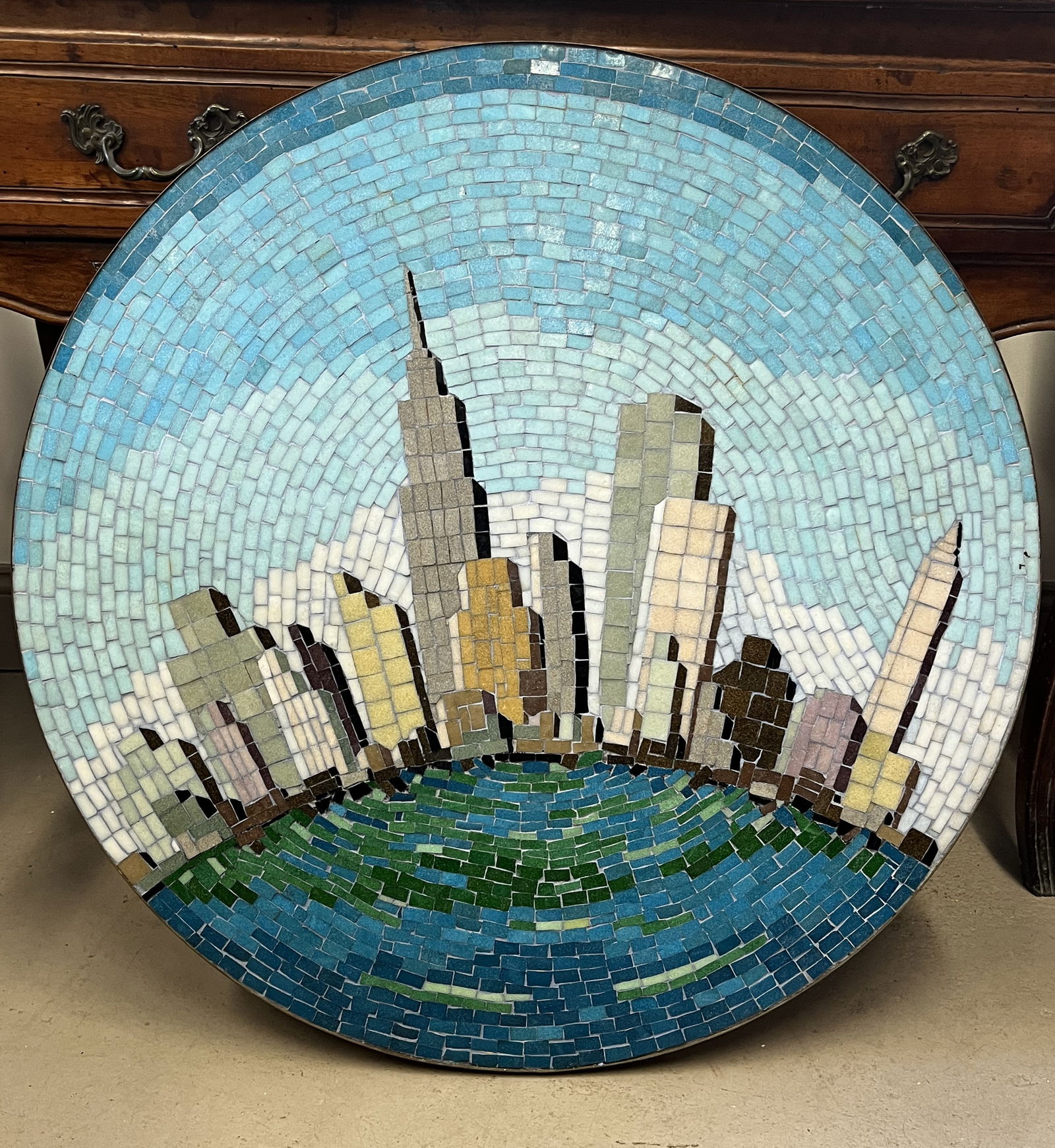Circular Mosaic of NYC: A circular wall-hanging mosaic of the NYC skyline, circa 1970.32" dia