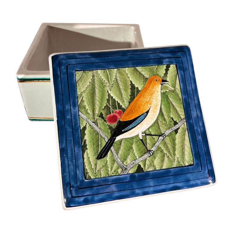 Faience Box with Lid, Palley: A hand-painted faience box with lid by Claude and Slavik Palley (1920-2008), with a hand-painted bird on the lid, retailed by Pierre Deux in the 1970's and 80's, signed by the artist. 8" w x 5" d x 9.