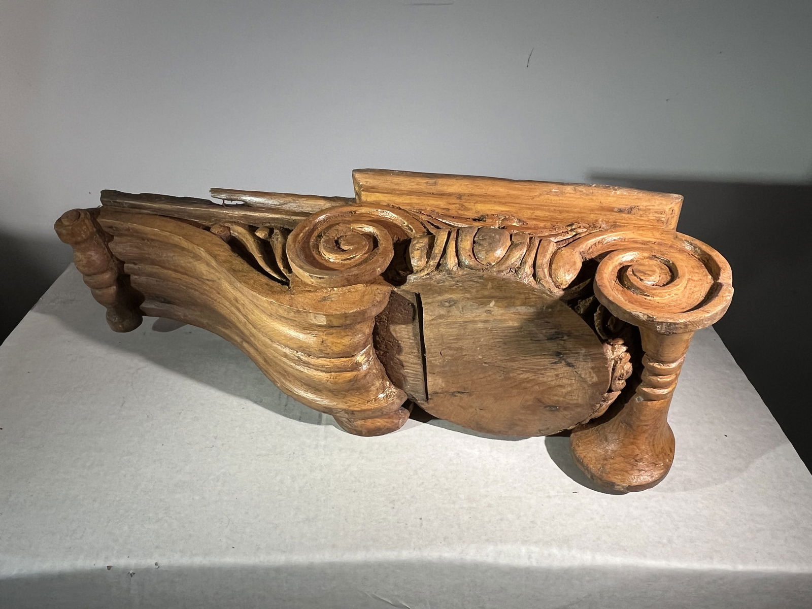 Carved Oak Architectural Bracket: A carved oak architectural bracket/capital, circa 1900.21" w x 9" d x 4.5" h