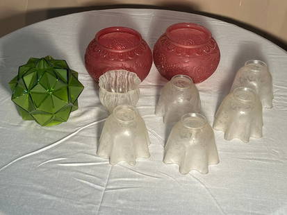 9 Assorted Glass Shades, 1920's: A group of 9 assorted glass shades, including a pair f cranberry glass shades and a green geometric form shade. Largest 7.5" x 5" dia.